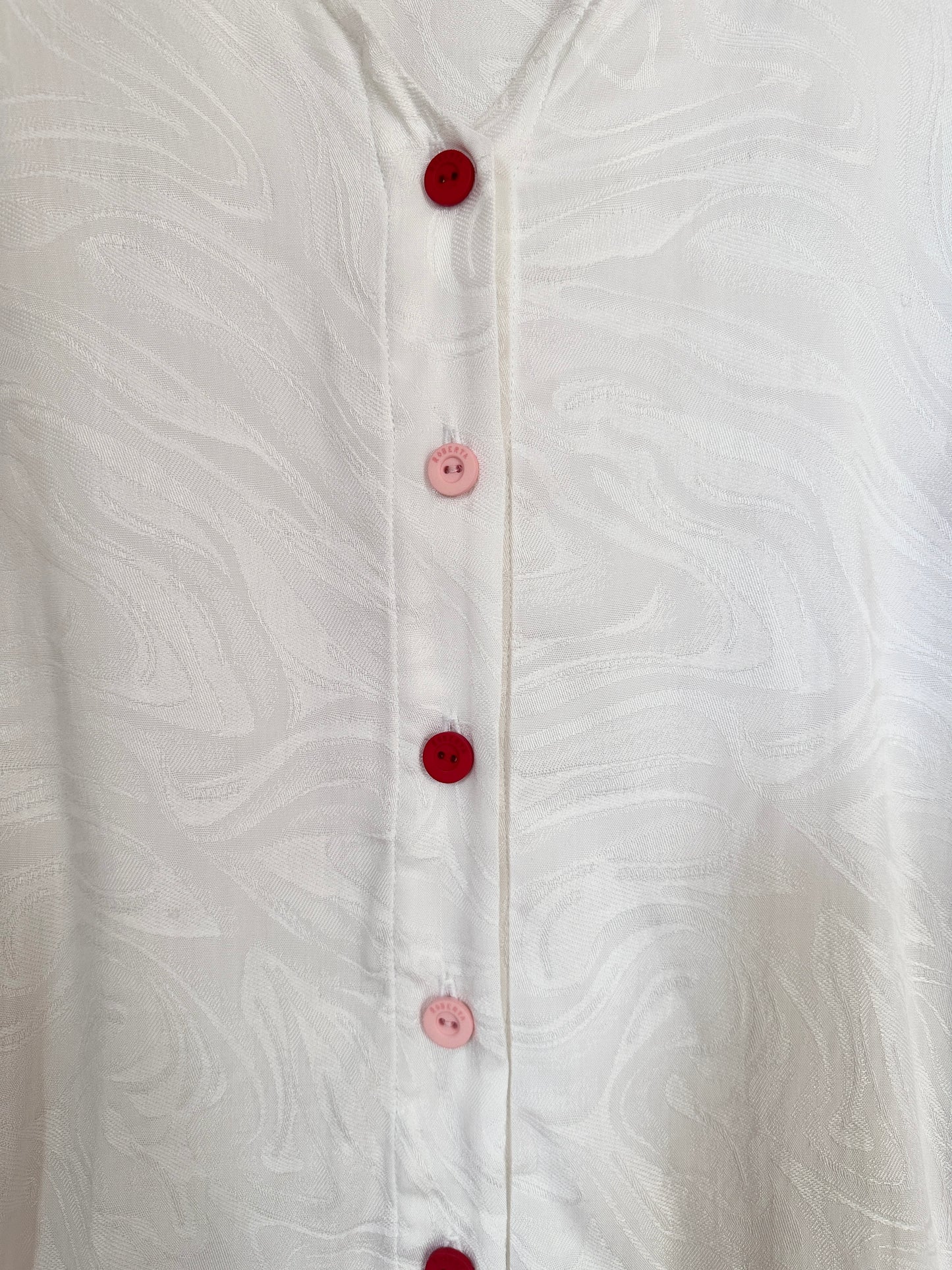 TOP VELIZ BLANCO BOTONES COLOR