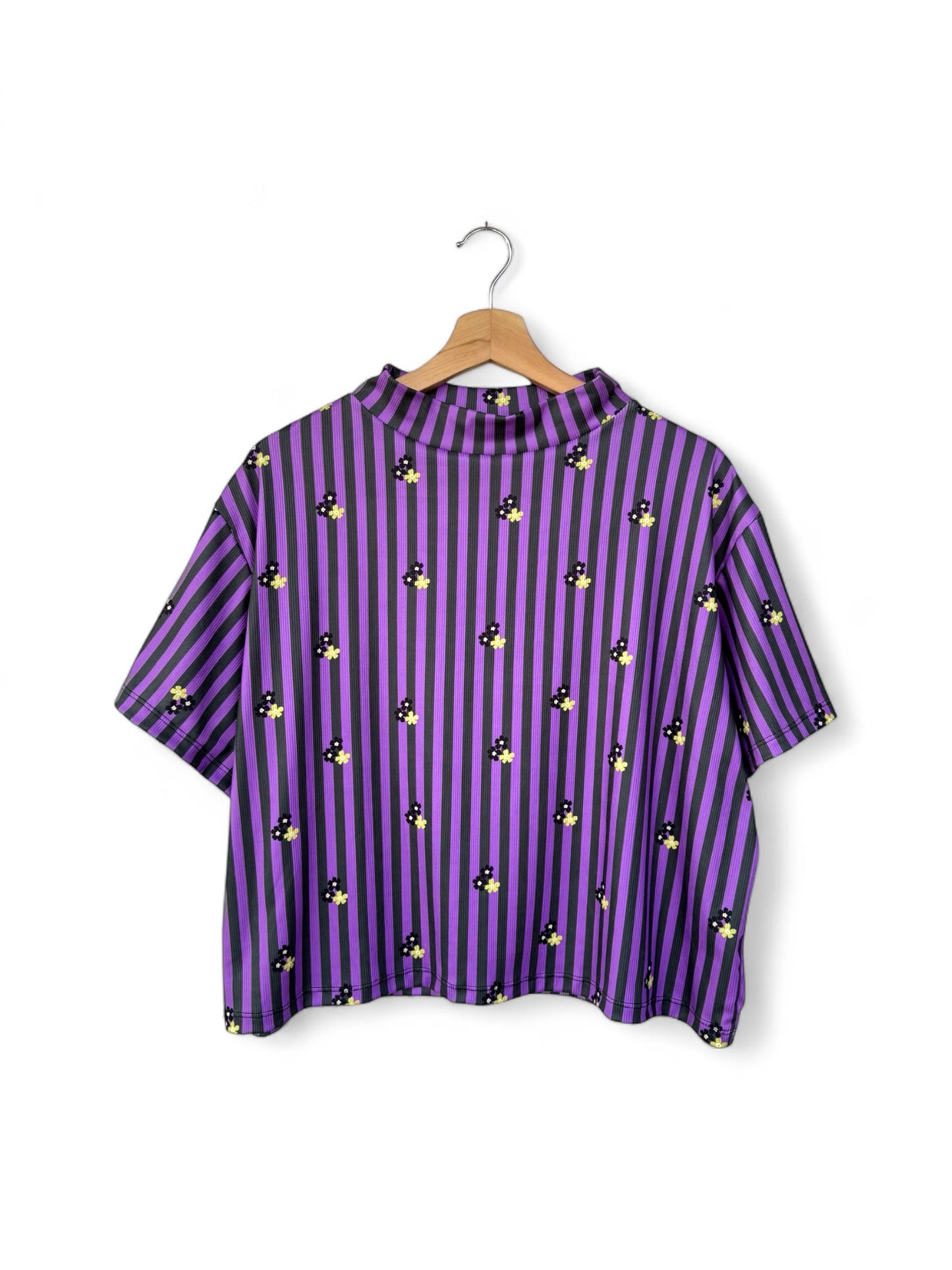 POLERA TORTUGA RAYAS FLORES
