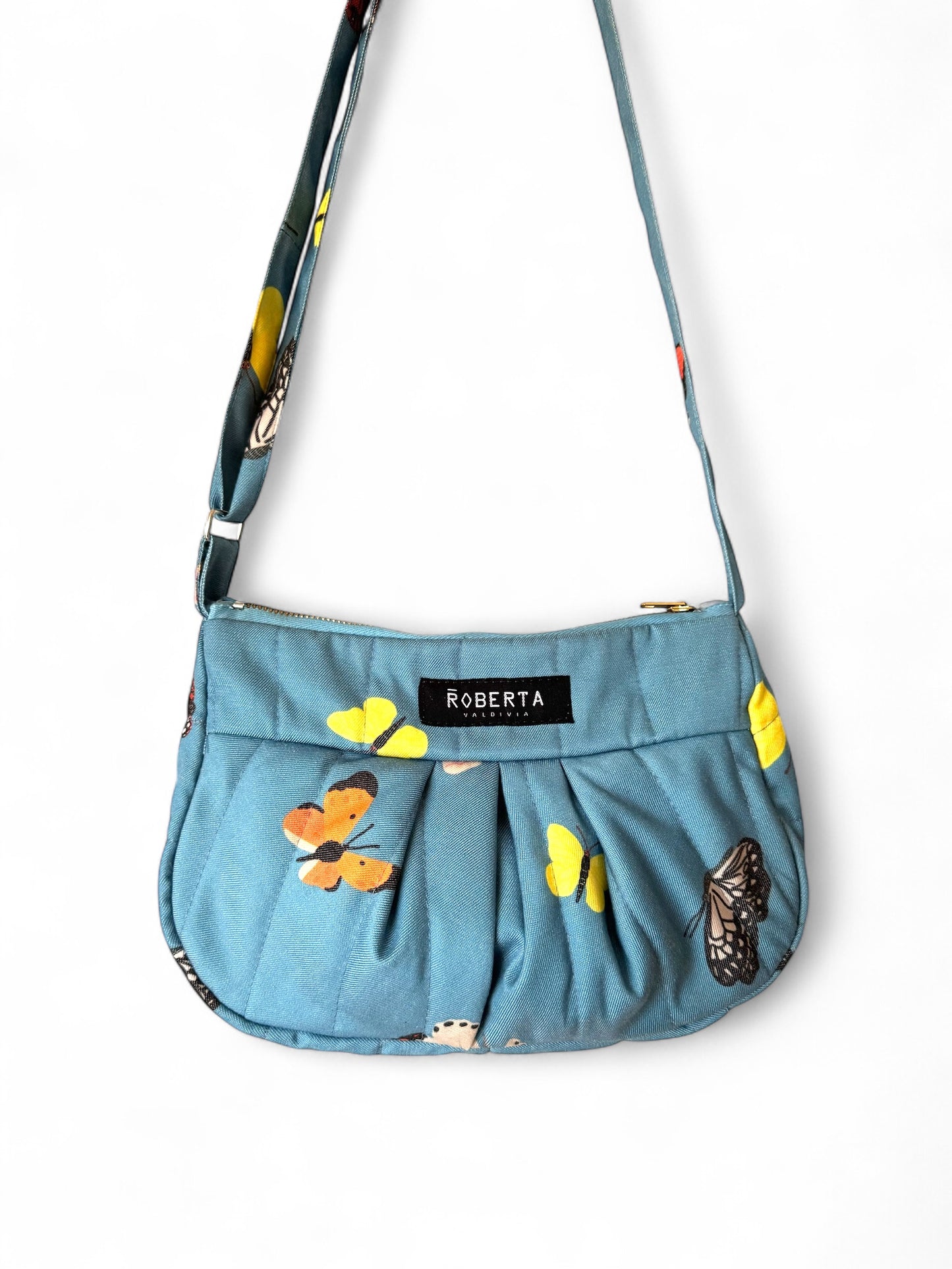 CARTERA ACOLCHADA MARIPOSAS CELESTE