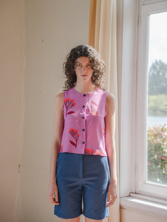 TOP CALIZ FLORES FUCSIA