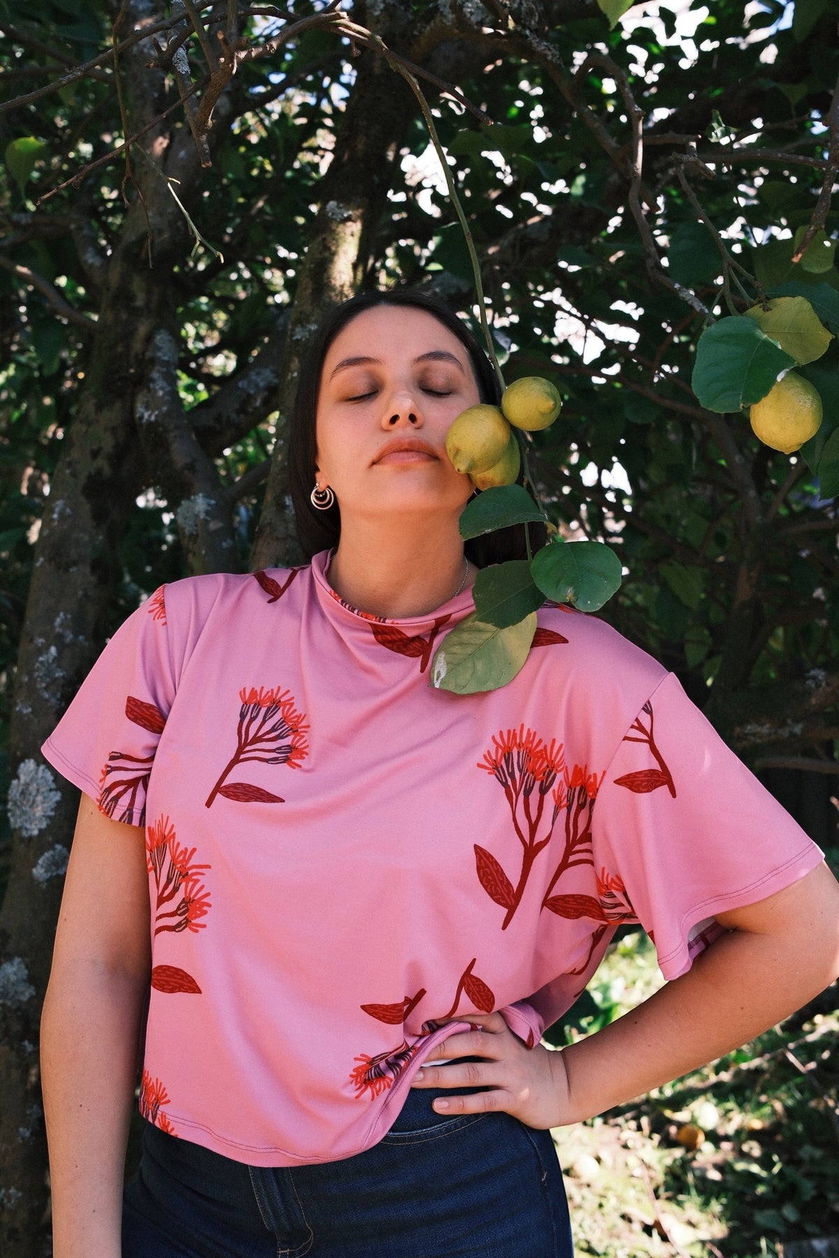 POLERA TORTUGA FLORES FUCSIA