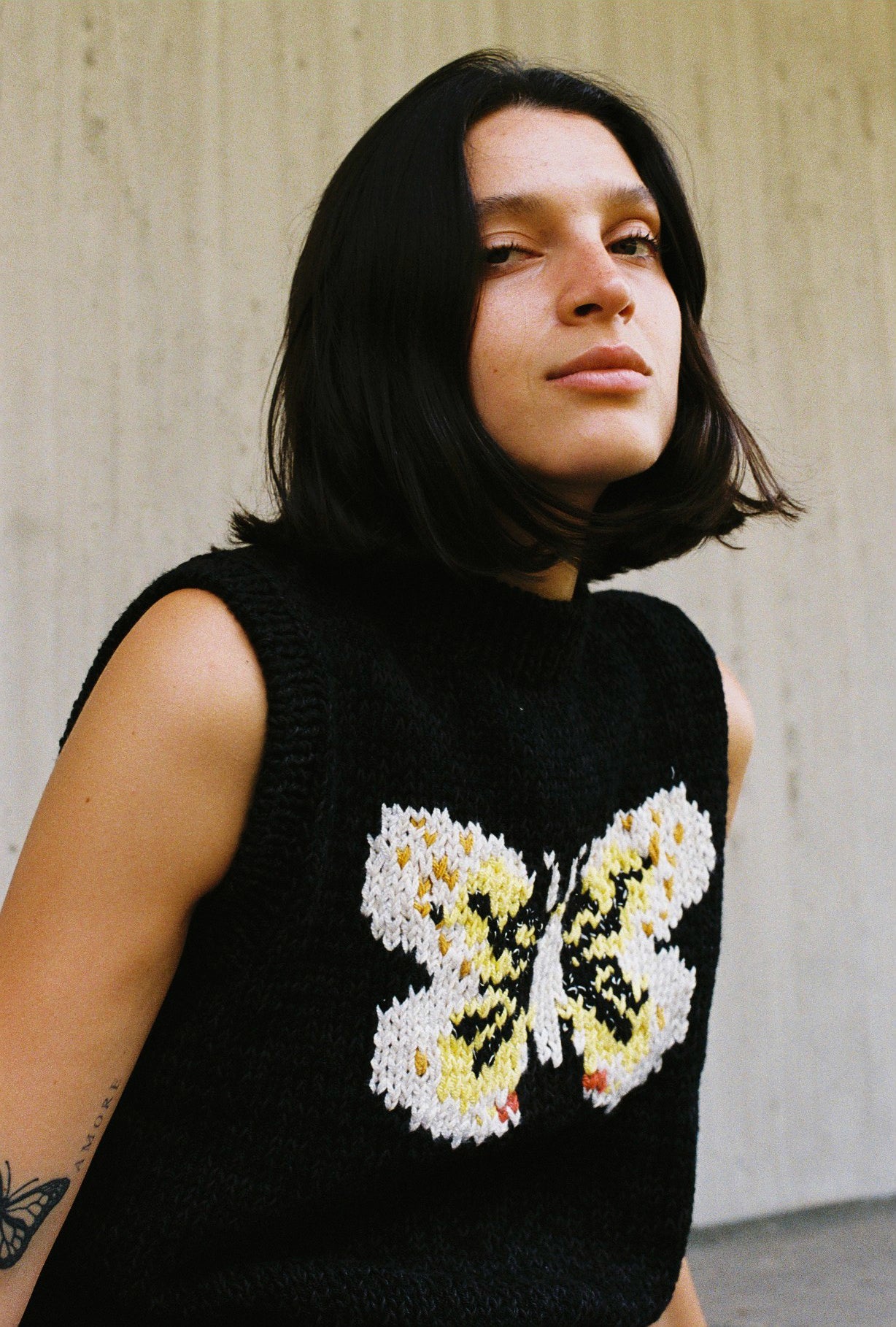 SWEATER SIN MANGAS MARIPOSA NEGRO