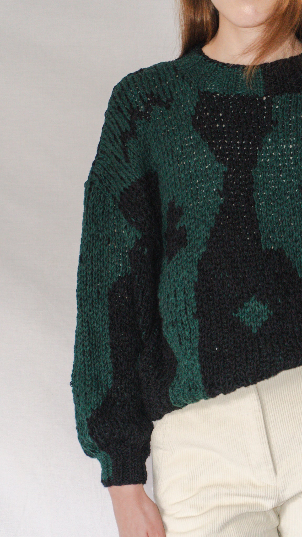 SWEATER CARPET NEGRO VERDE BOTELLA
