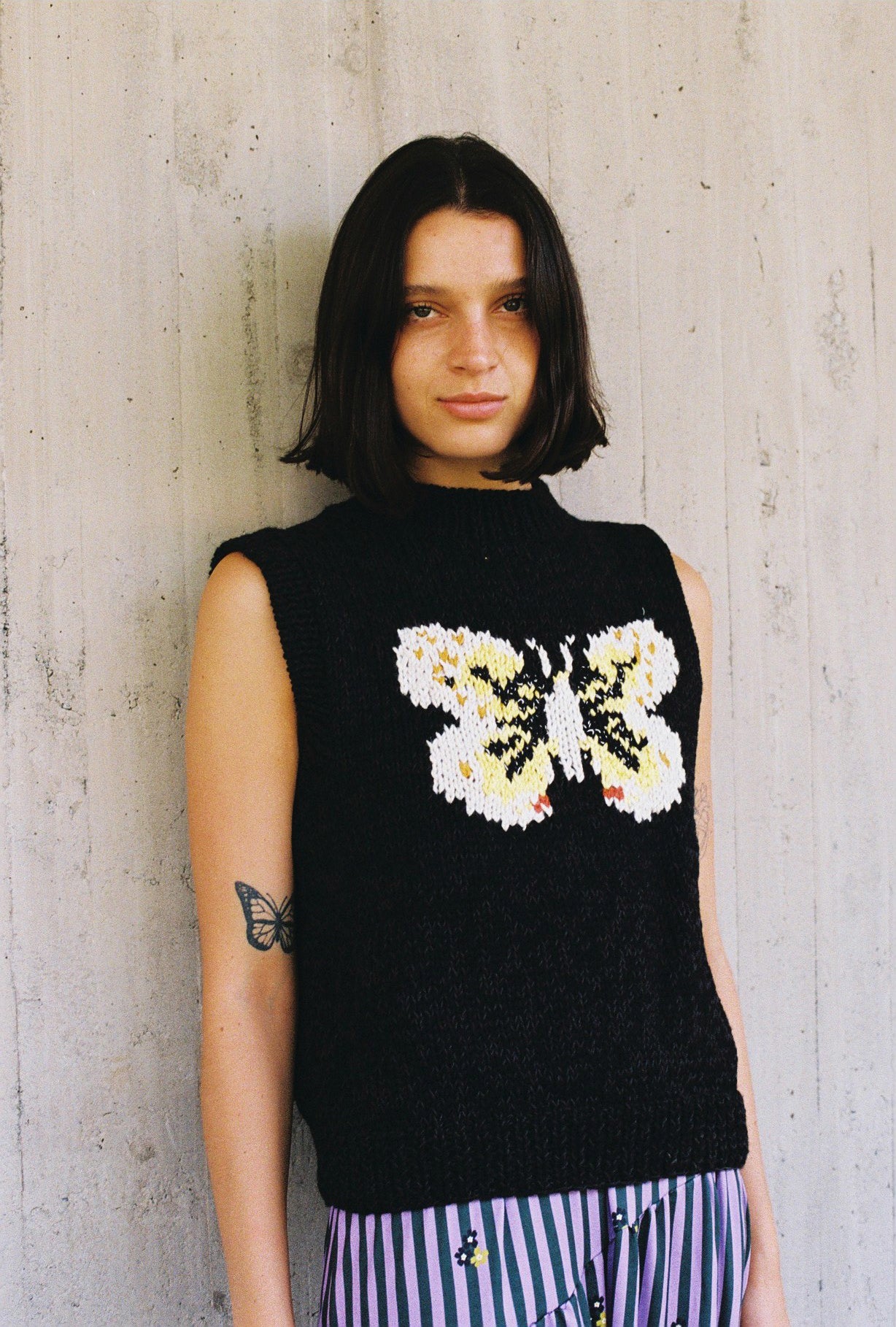 SWEATER SIN MANGAS MARIPOSA NEGRO