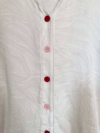 TOP VELIZ BLANCO BOTONES COLOR