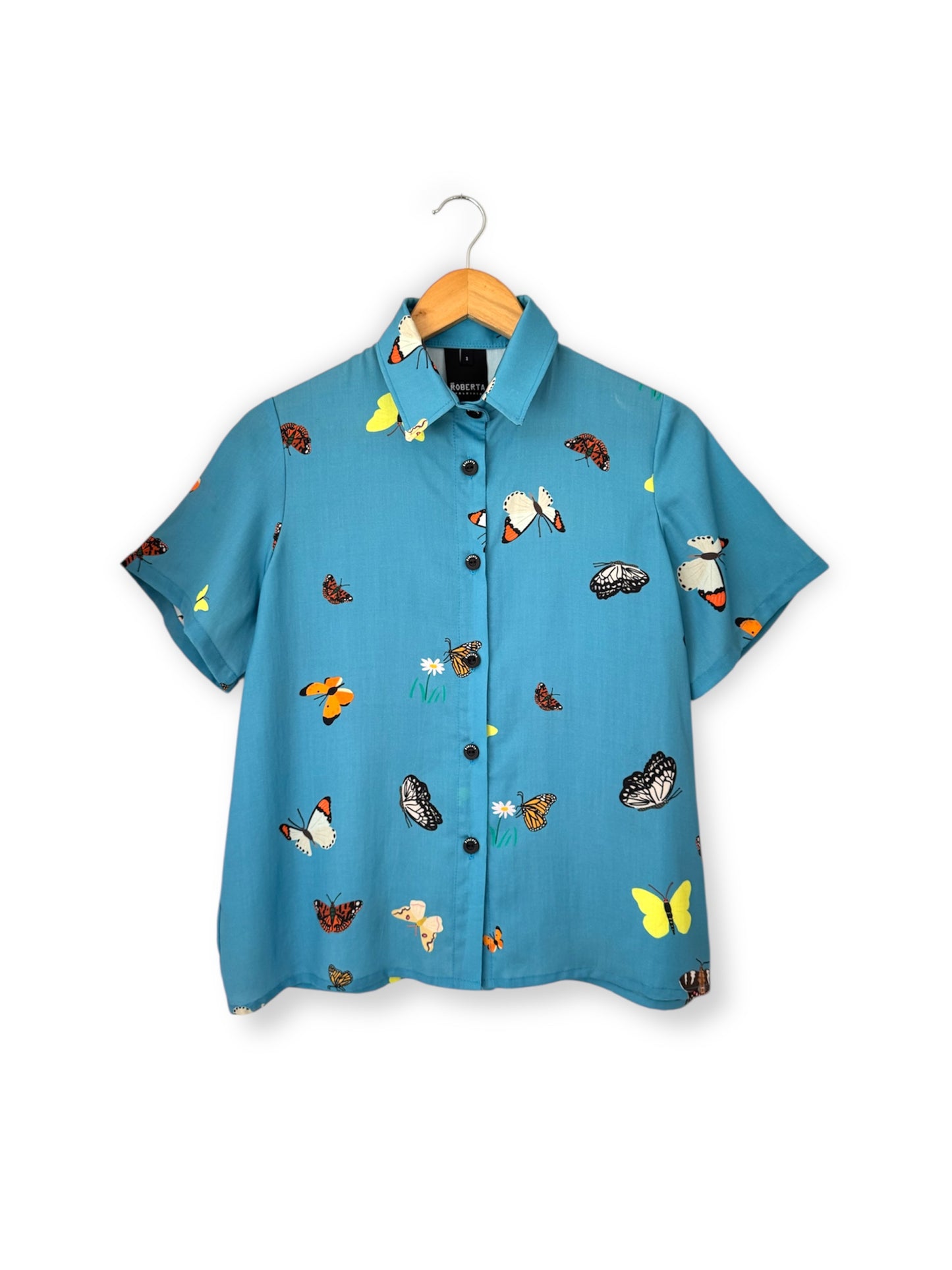 CAMISA BOTONERA CORTA MARIPOSAS CELESTE