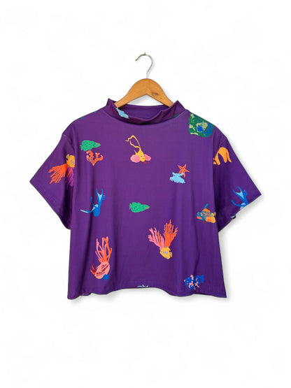POLERA TORTUGA PECES MORADO OSCURO