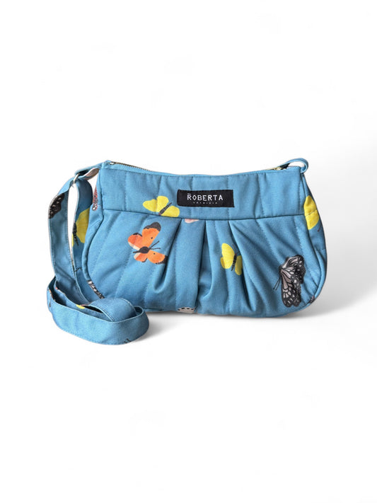 CARTERA ACOLCHADA MARIPOSAS CELESTE