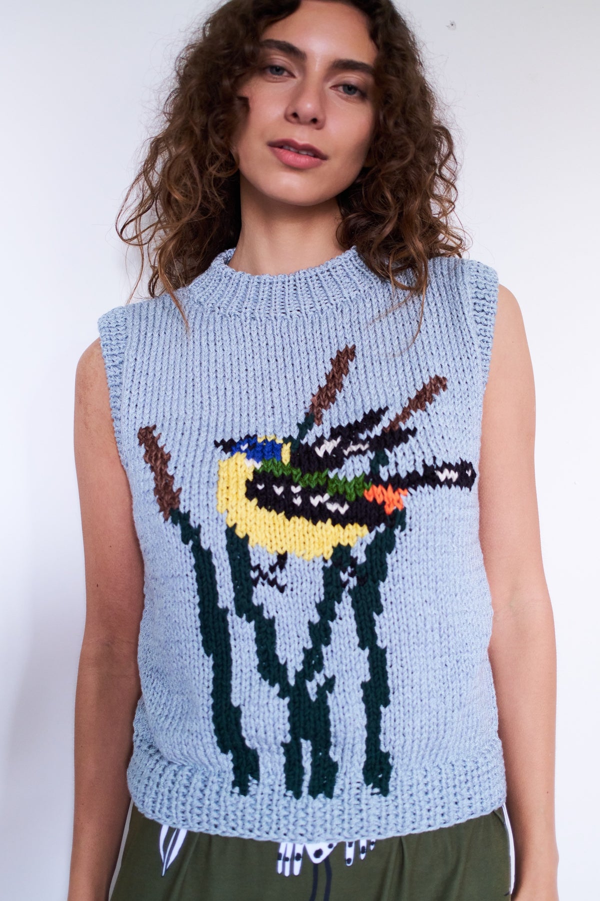 SWEATER SIN MANGAS SIETE COLORES