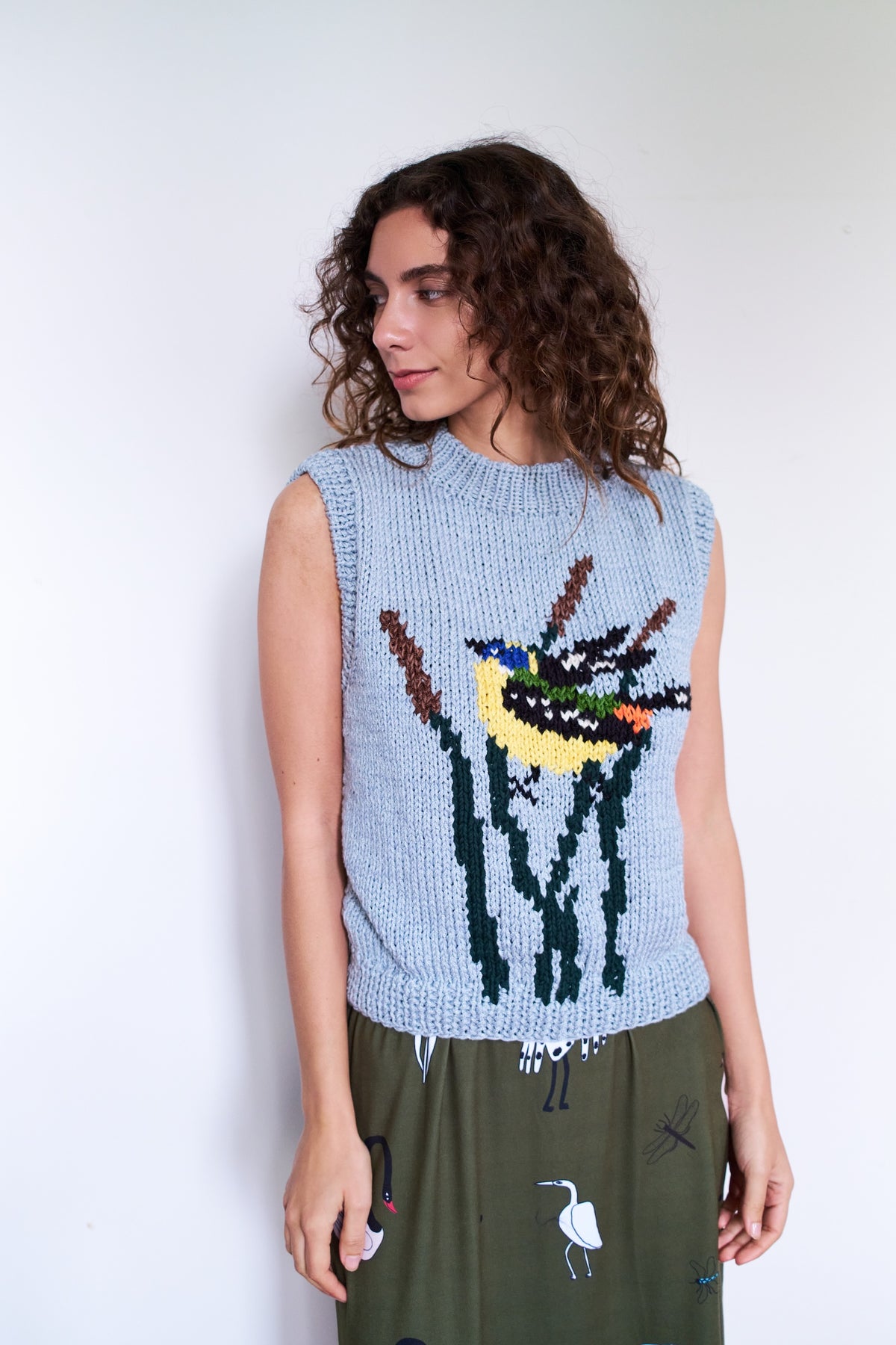 SWEATER SIN MANGAS SIETE COLORES