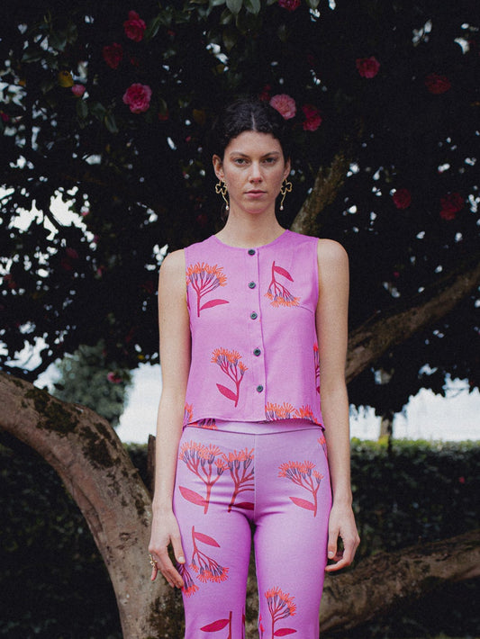 TOP CALIZ FLORES FUCSIA